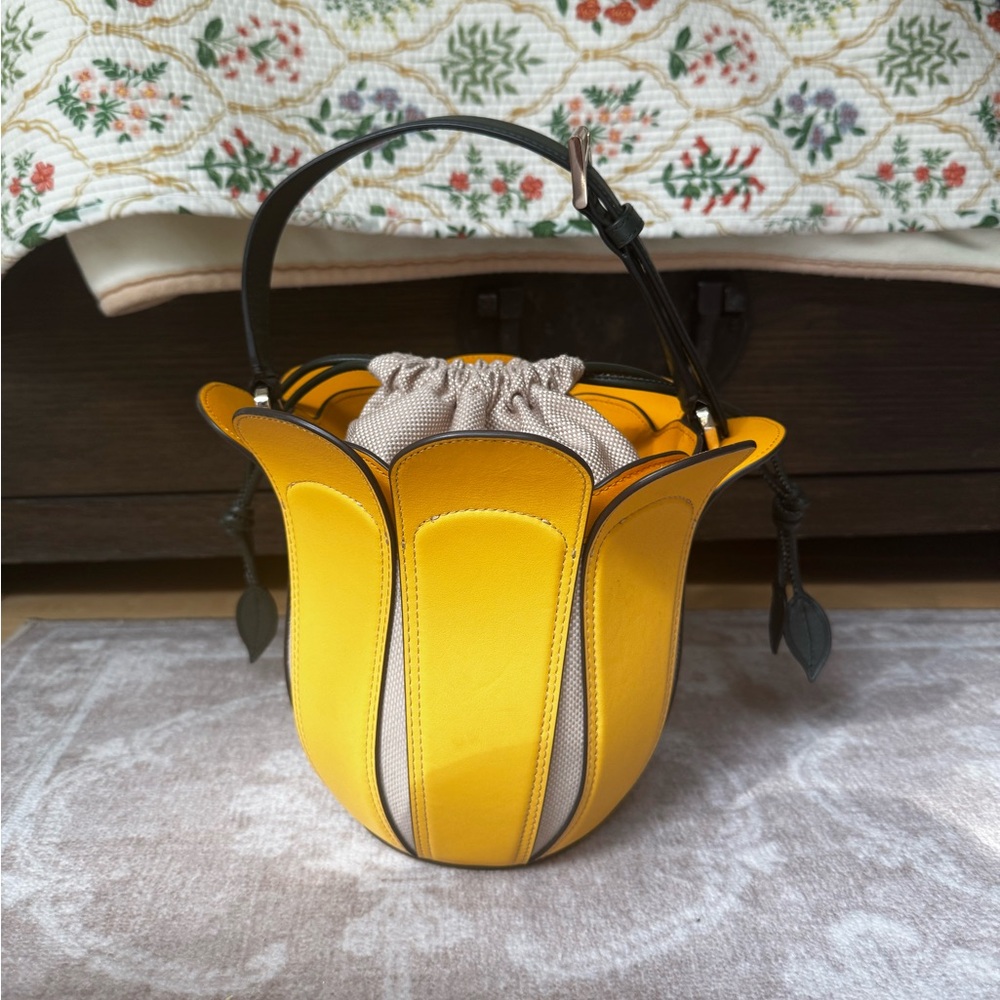 Kate Spade New York
medium petal leather bucket bag 🌼
